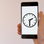 person holding black android smartphone