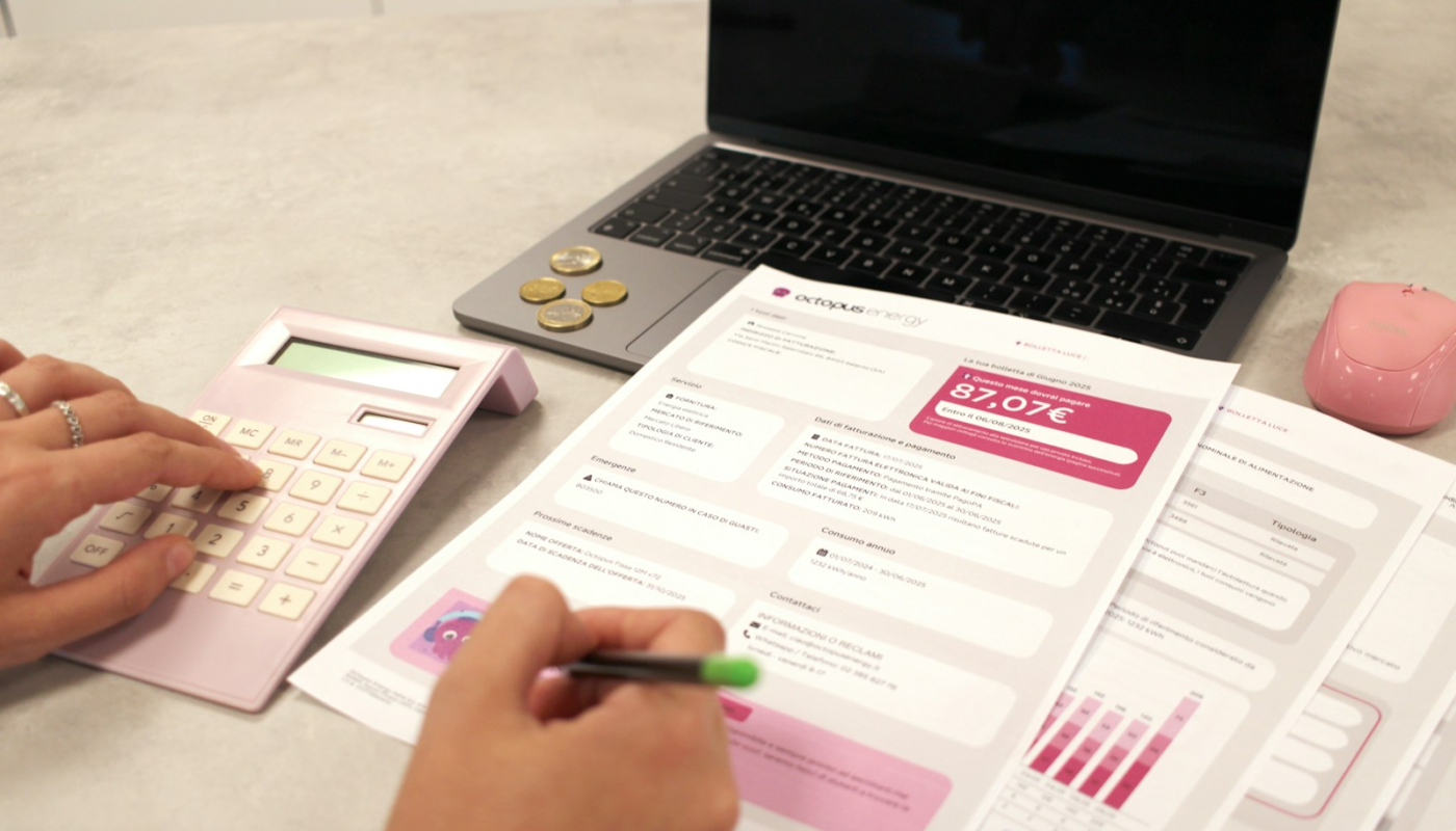 Someone is calculating their finances with documents.