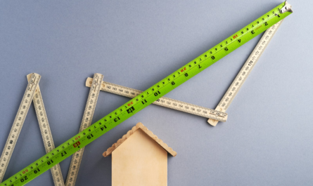 green ruler on white surface