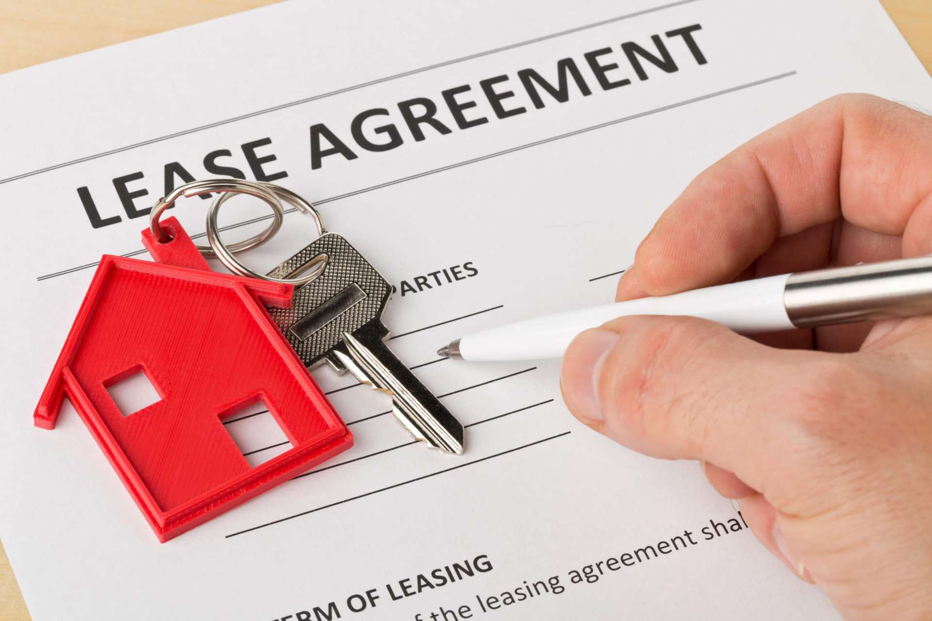 Rental lease agreement being reviewed before signing