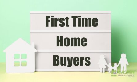 Homebuyer mortgage documents and house keys for closing preparation