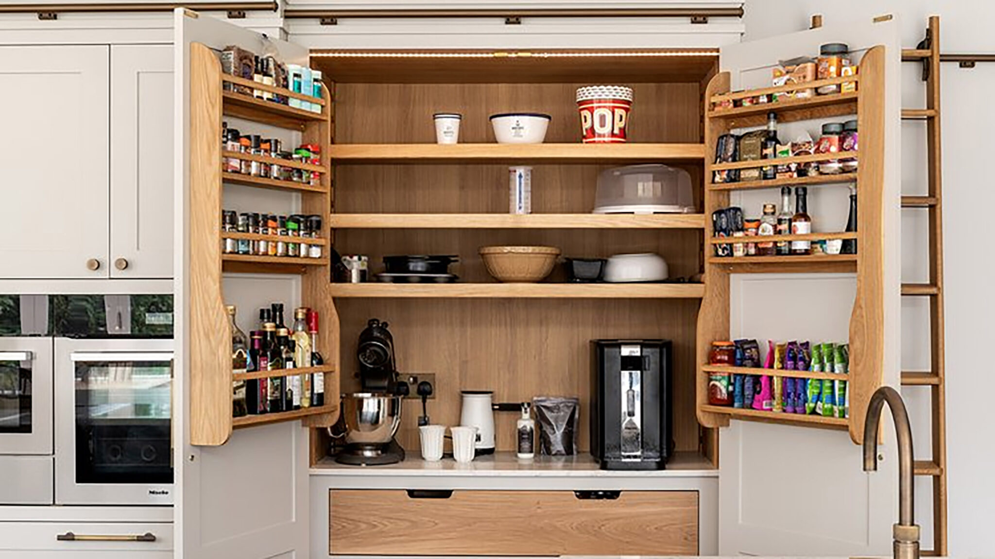 Organized kitchen cabinet using one-in-one-out storage limits